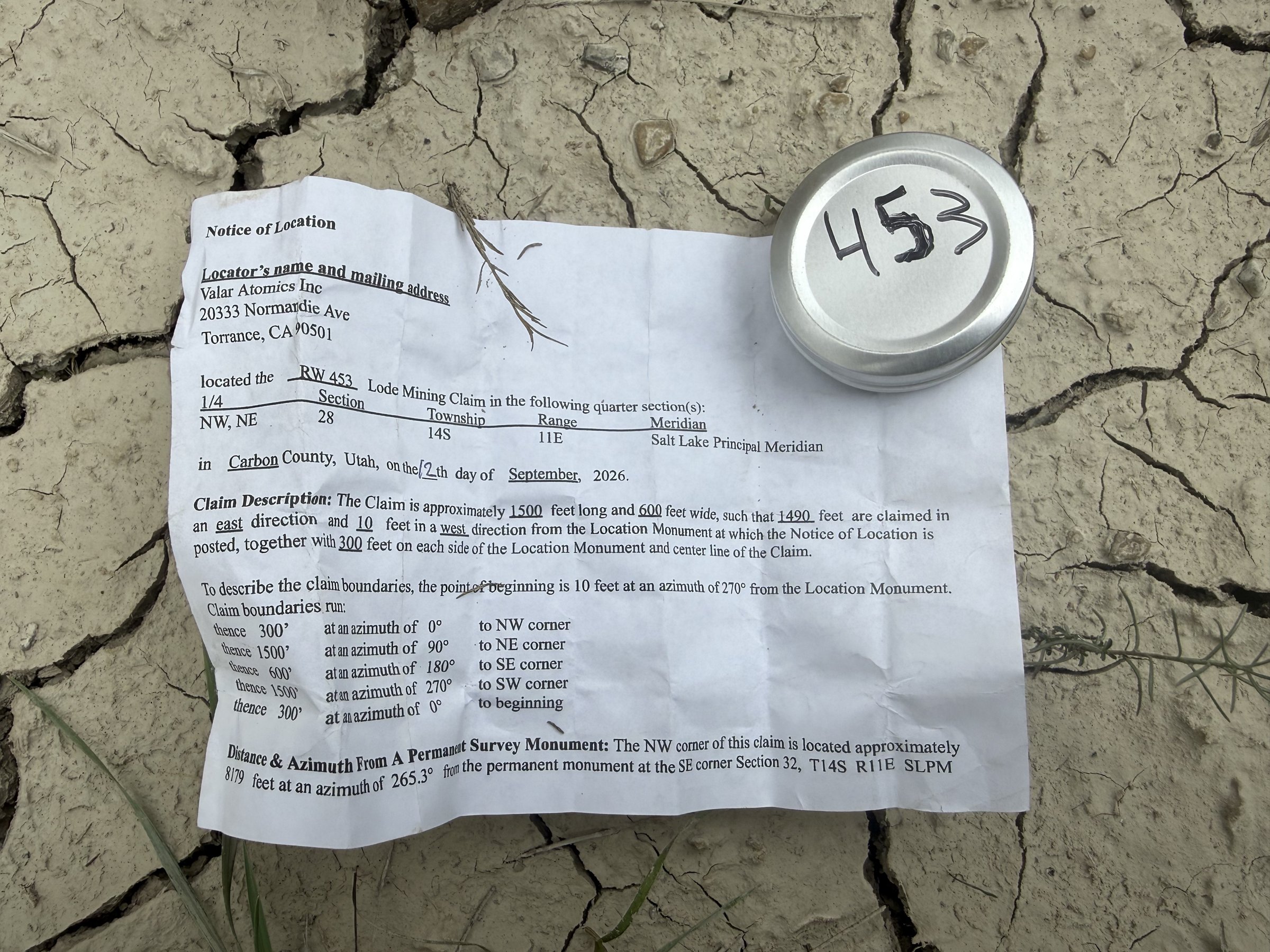 The claim's Notice of Location, photographed with the tag's canister, October 2026.